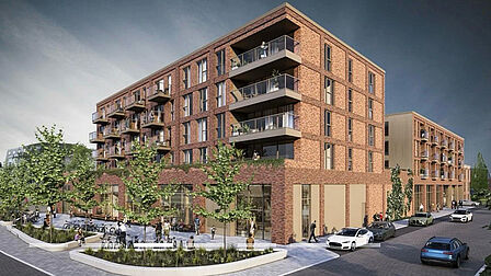 Impressie van een appartementecomplex met winkelruimte onderin