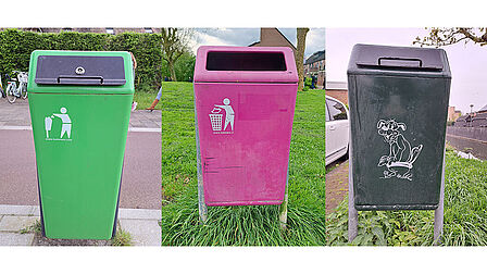 Groene afvalbak, roze afvalbak en afvalbak met afbeelding van hond erop